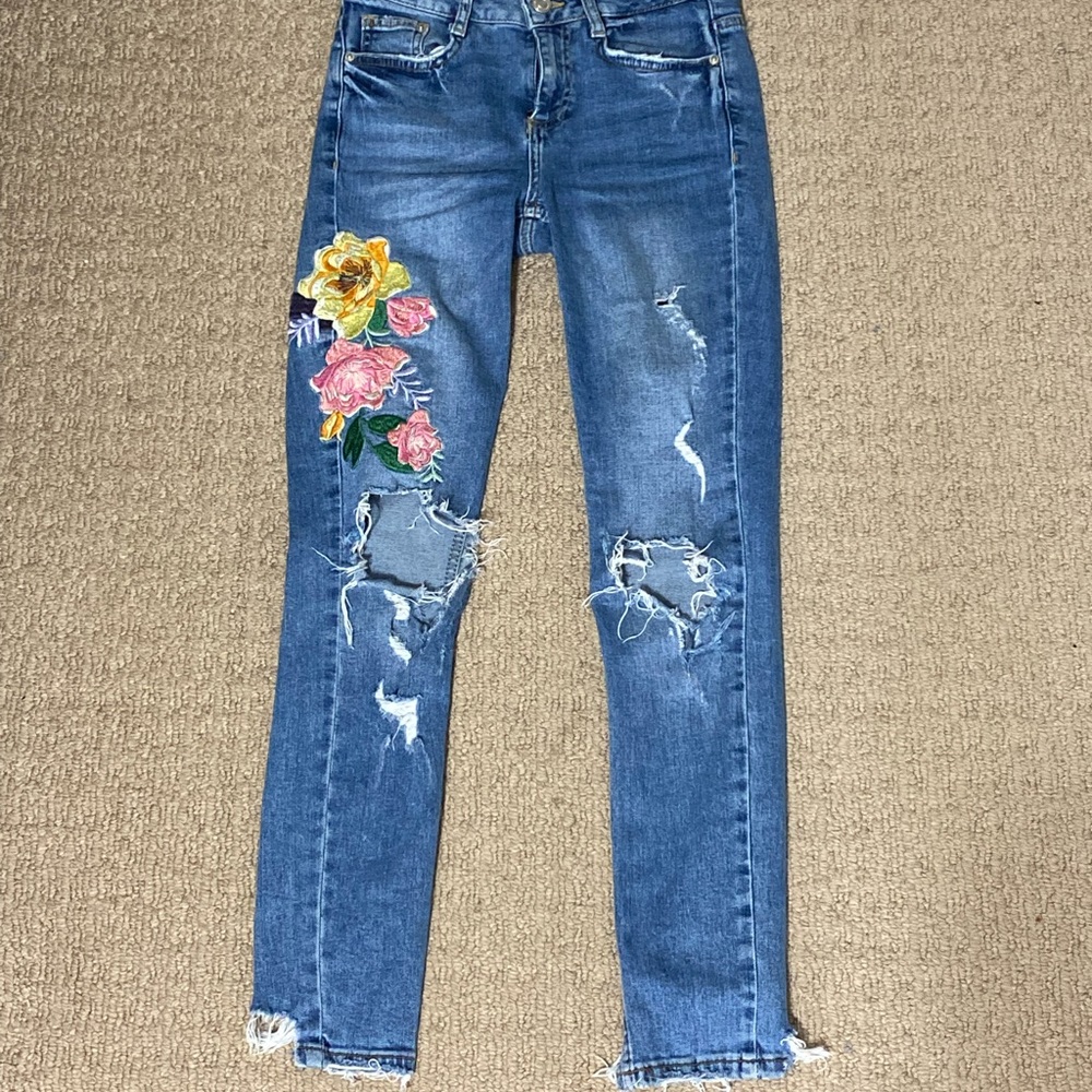 Skinny ripped jeans